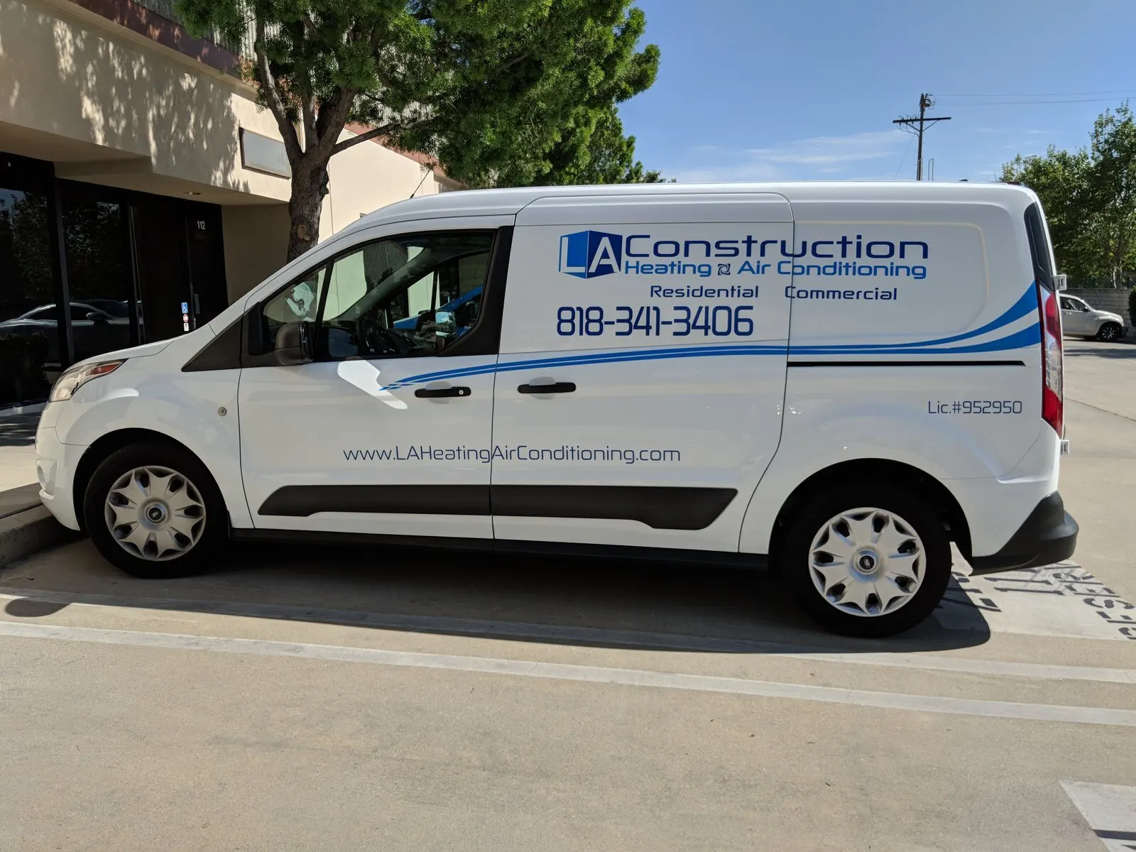Lettering and logo on a Transit Connect.