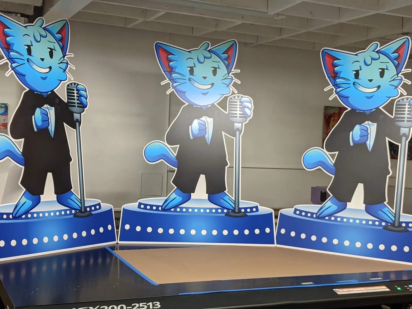 Printed and cut standees.