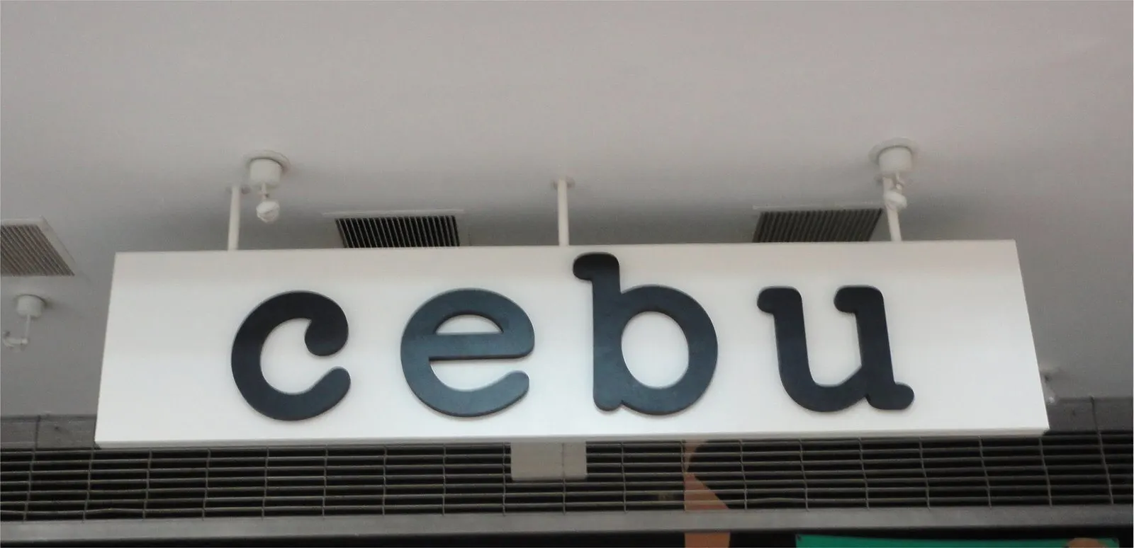 Illuminated cabinet with dimensional letters.