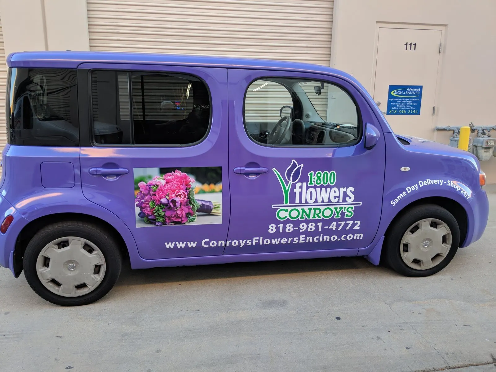 Full wrap on a Nissan Cube.
