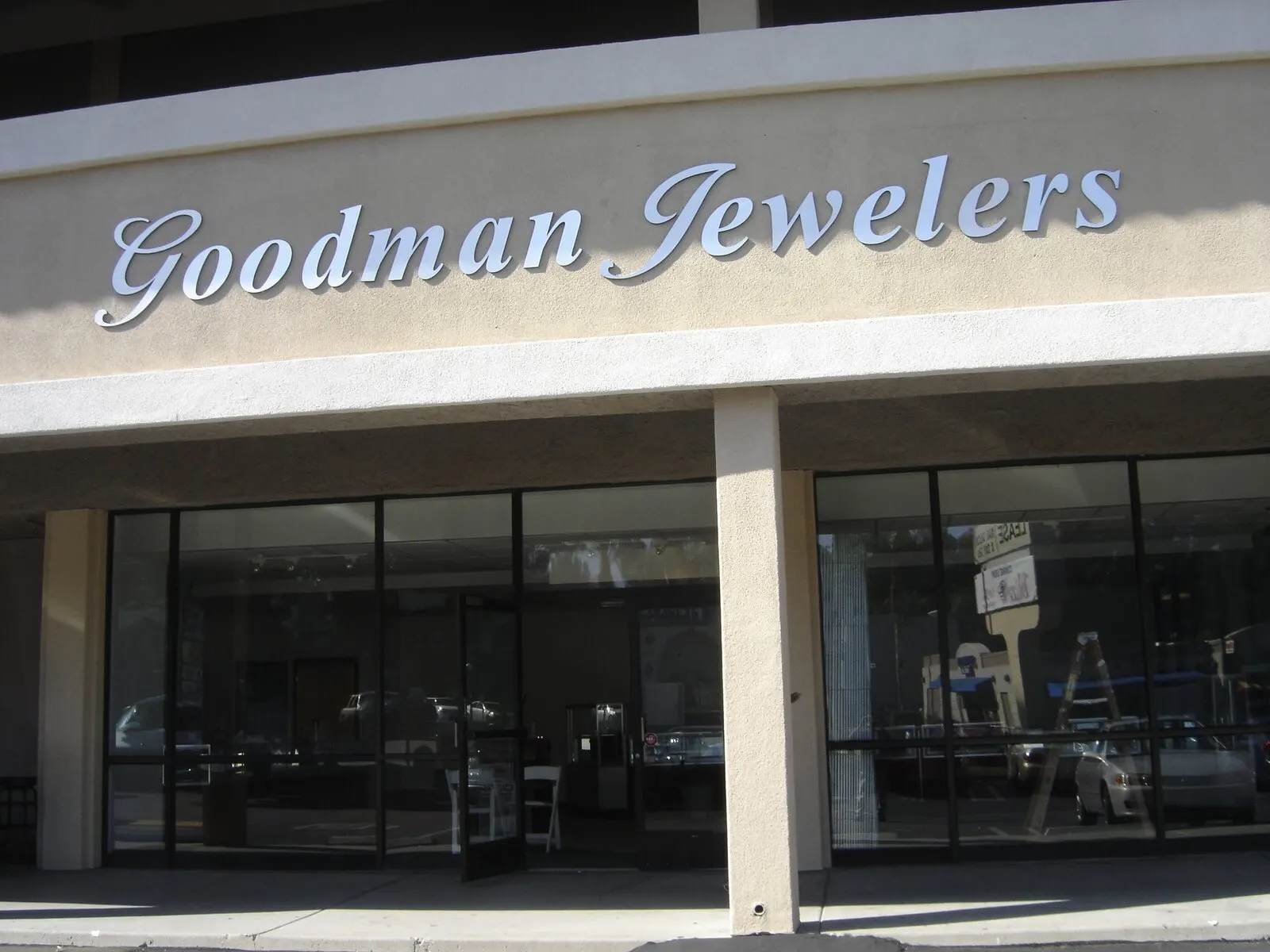 Script letters on a storefront fascia.