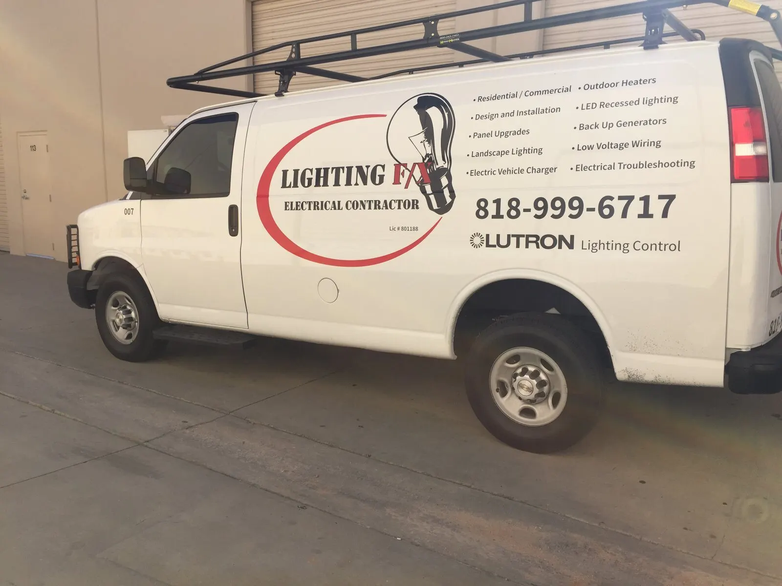 Lettering and logo on a cargo van.
