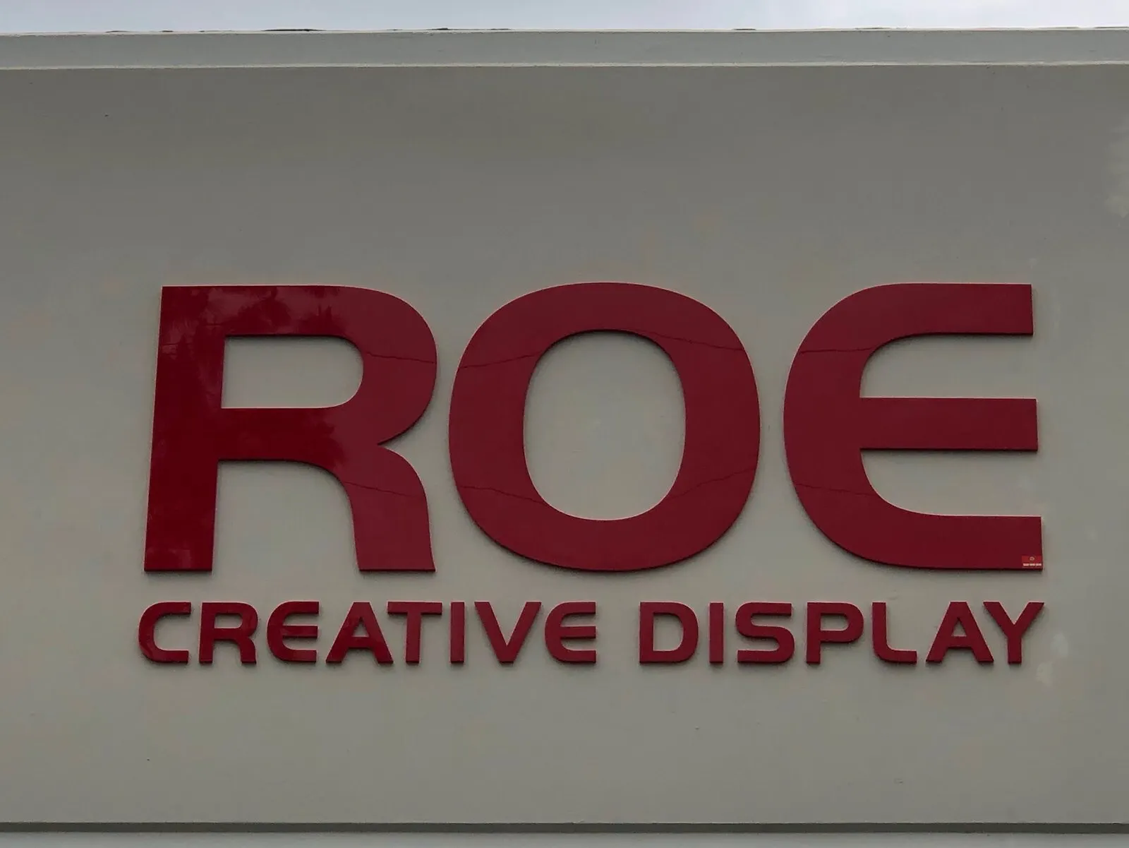 Painted dimensional letters, close up.