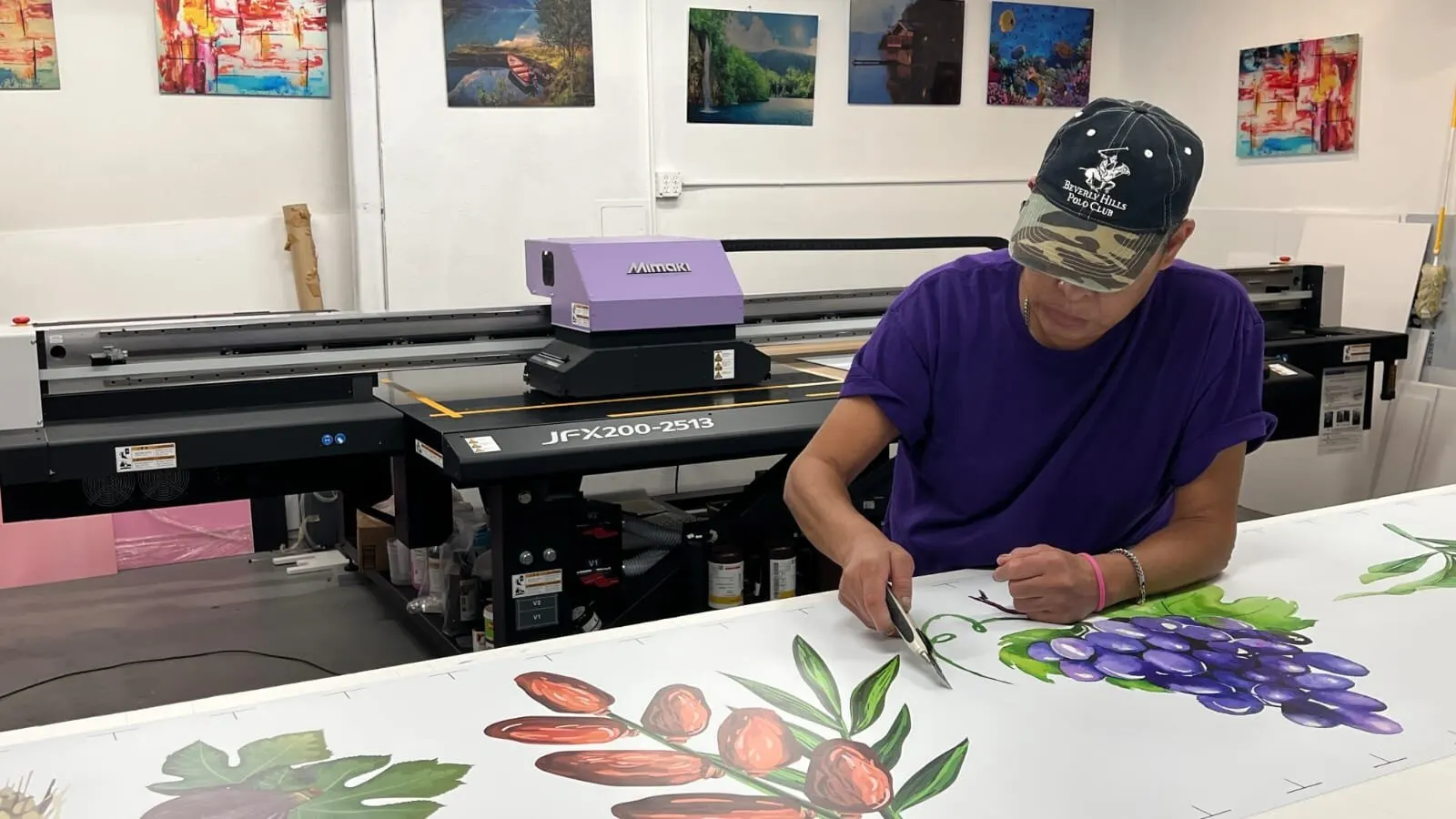 Checking a print on the UV flatbed in the Chatsworth shop