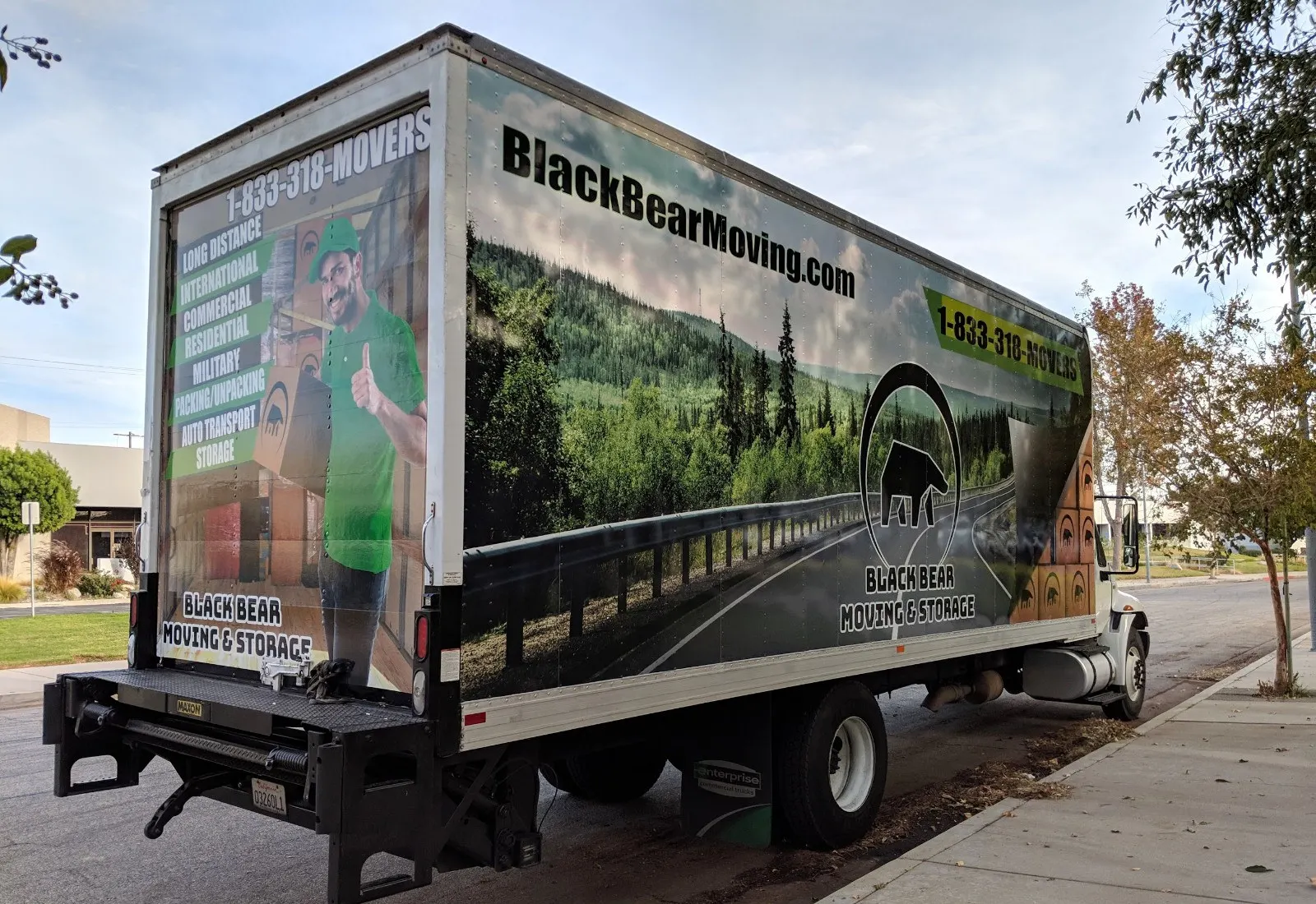 Full-color printed wrap on a box truck.